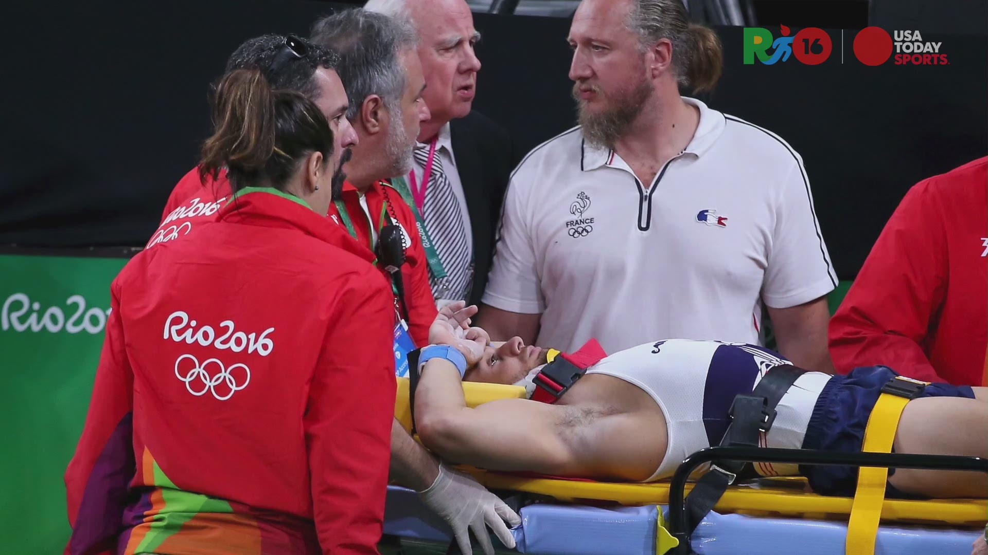 Injured Olympic gymnast Samir Ait Said put on stretcher ...