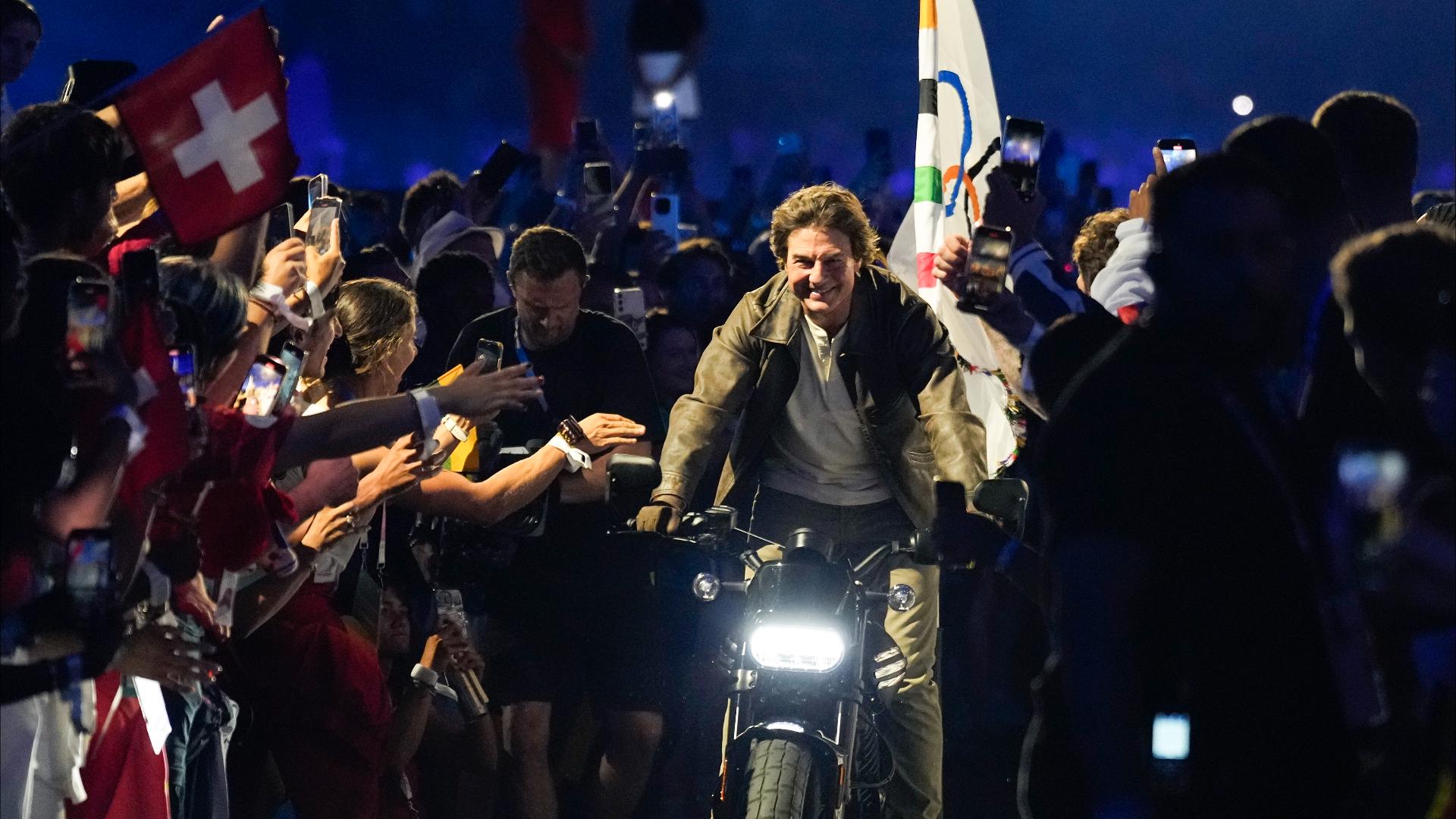 How much did Tom Cruise get paid for his Olympics stunts?